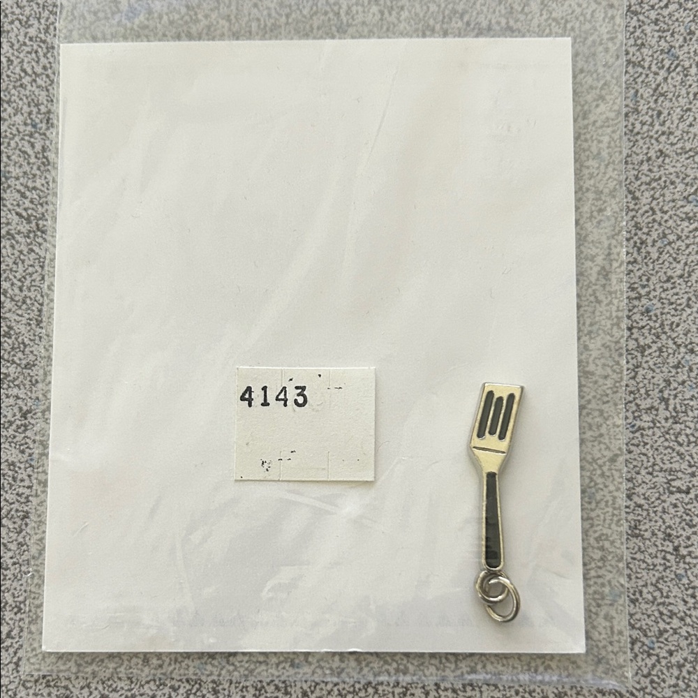 Spatula Charm